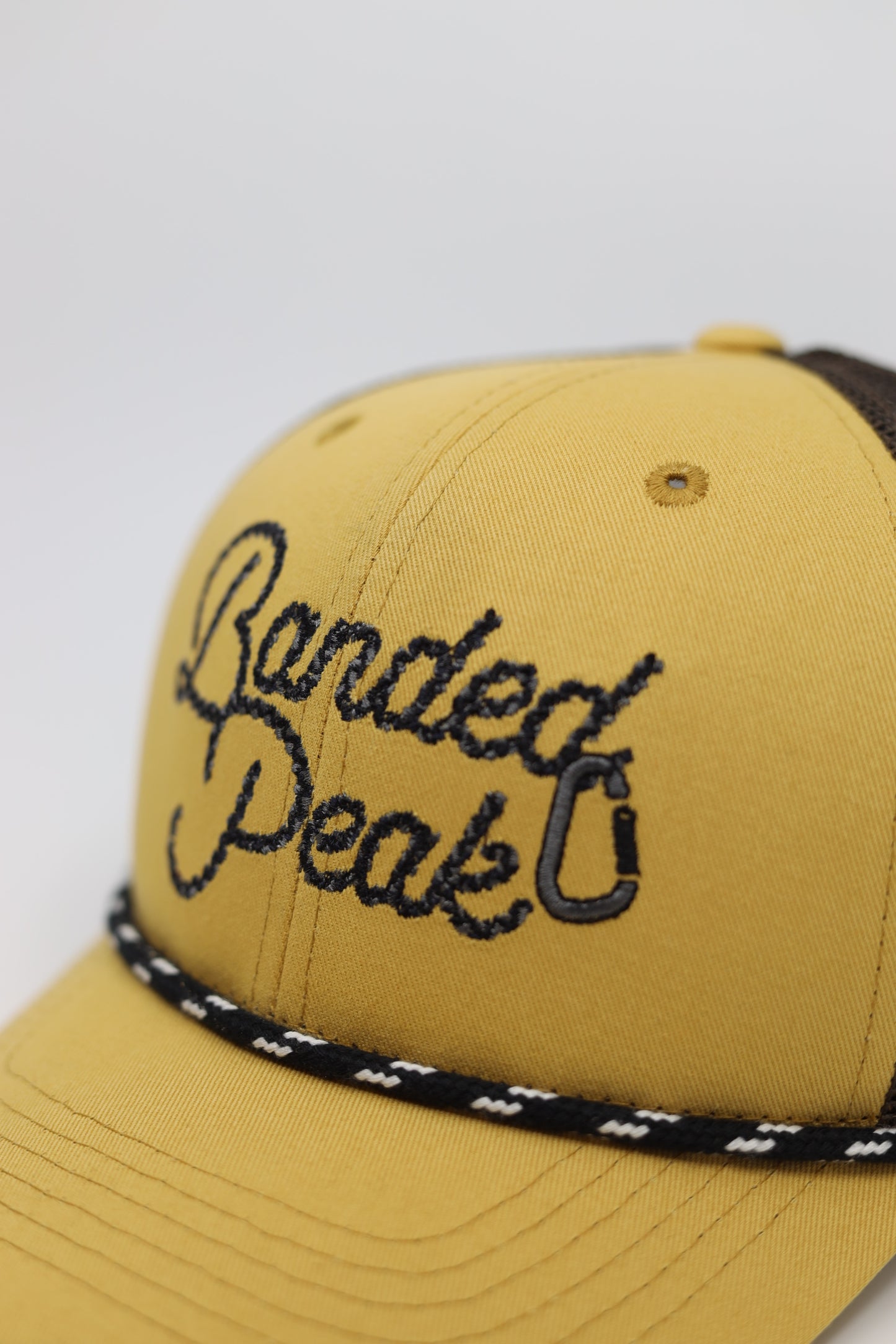 Banded Peak Rope Trucker Hat